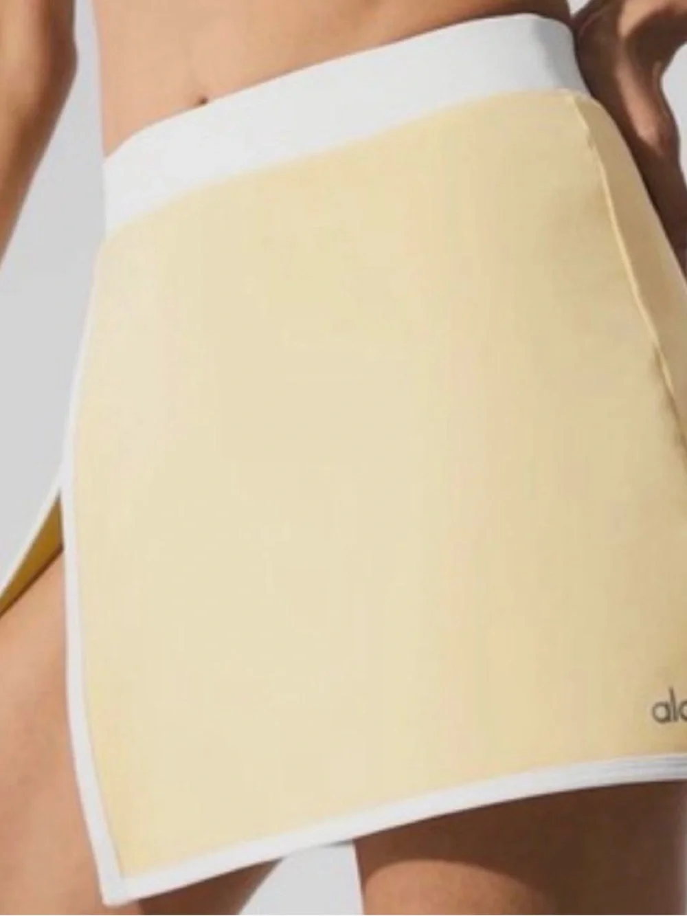 ALO Yoga Pale Yellow Mini Skirt with White Trim